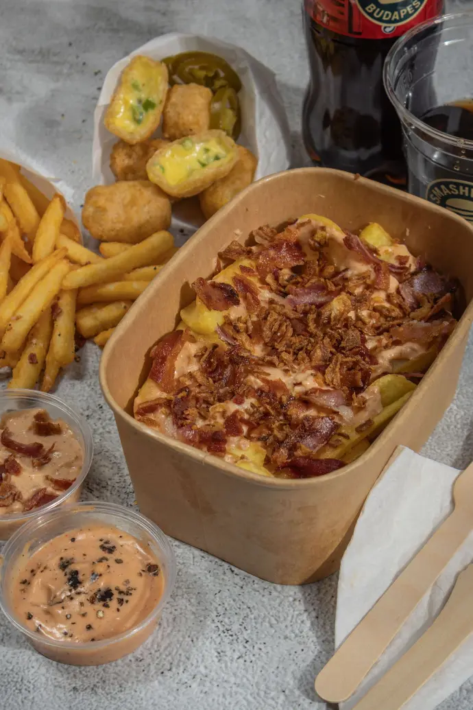 Loaded fries, crispy fries, chili cheese nuggets, sauce